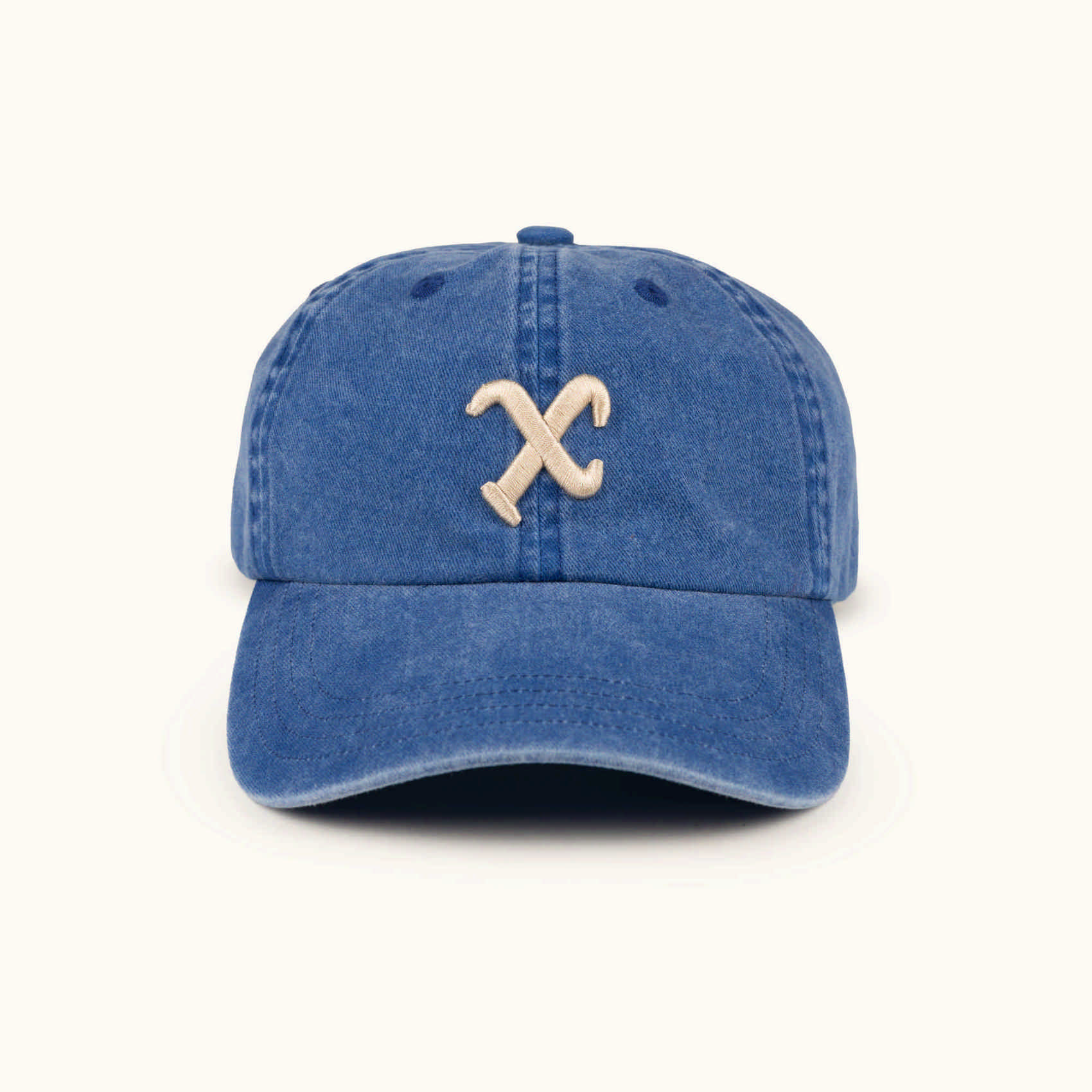 Electric blue cotton baseball cap with light brown detailing